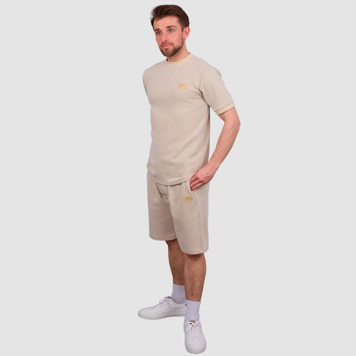 Man wearing West Ham Crucial Oat Shorts