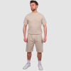 Model wearing West Ham Crucial Oat Shorts