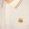 Close up of West Ham Castle Collection Cream Polo